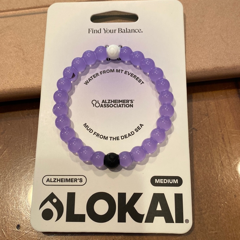 Brand new size medium Lokai bracelet color purple
